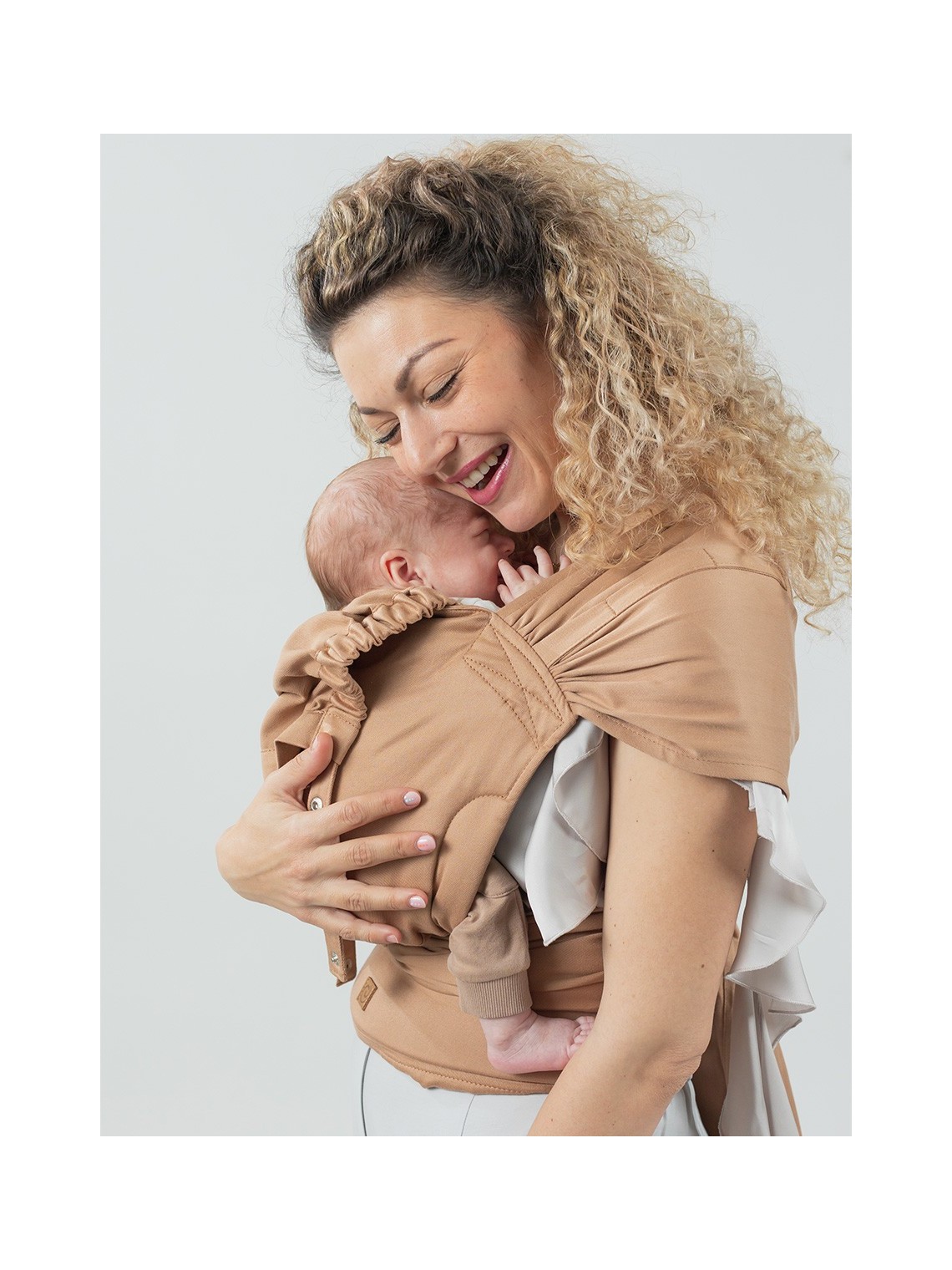 ISARA QuickTie – hybrid wrap conversion carrier with easy adjustment