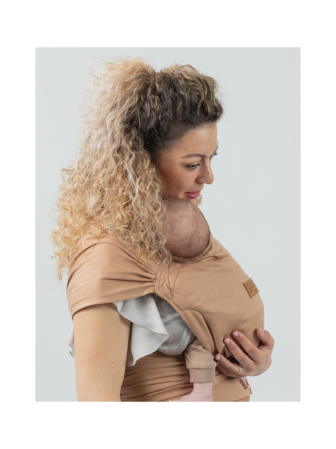 ISARA QuickTie – hybrid wrap conversion carrier with easy adjustment
