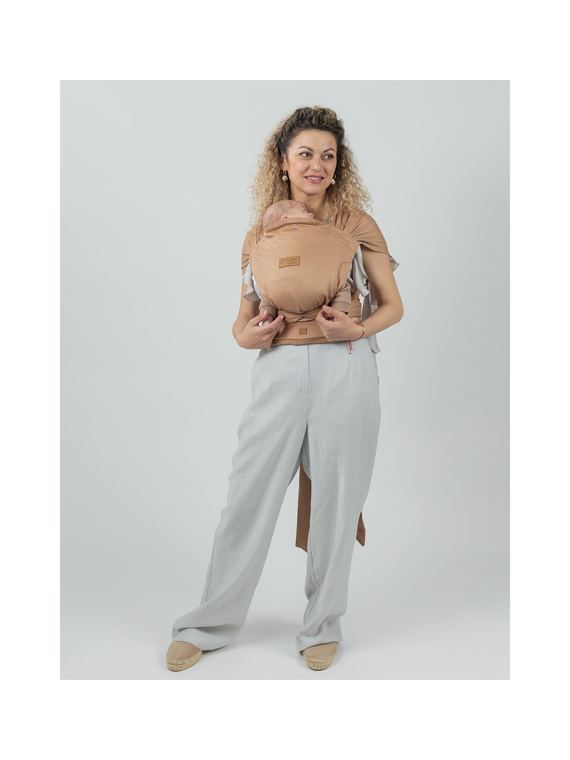 ISARA QuickTie – hybrid wrap conversion carrier with easy adjustment